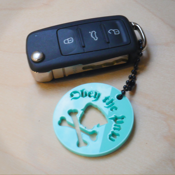 Obey the Paw keyring