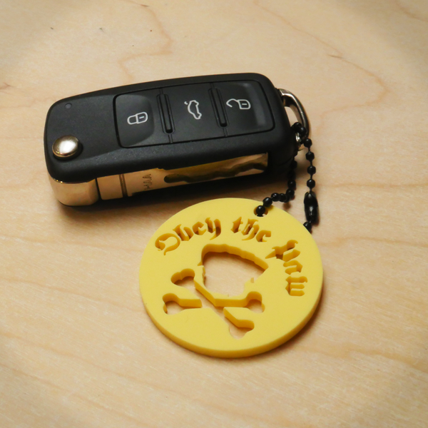 Obey the Paw keyring